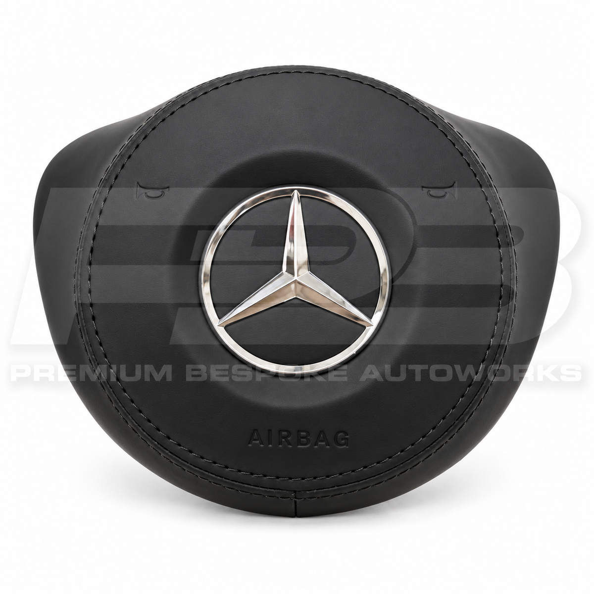 Mercedes A45 AMG W176 custom airbag cover in black leather with black stitching, front view, replaces the original plastic cover
