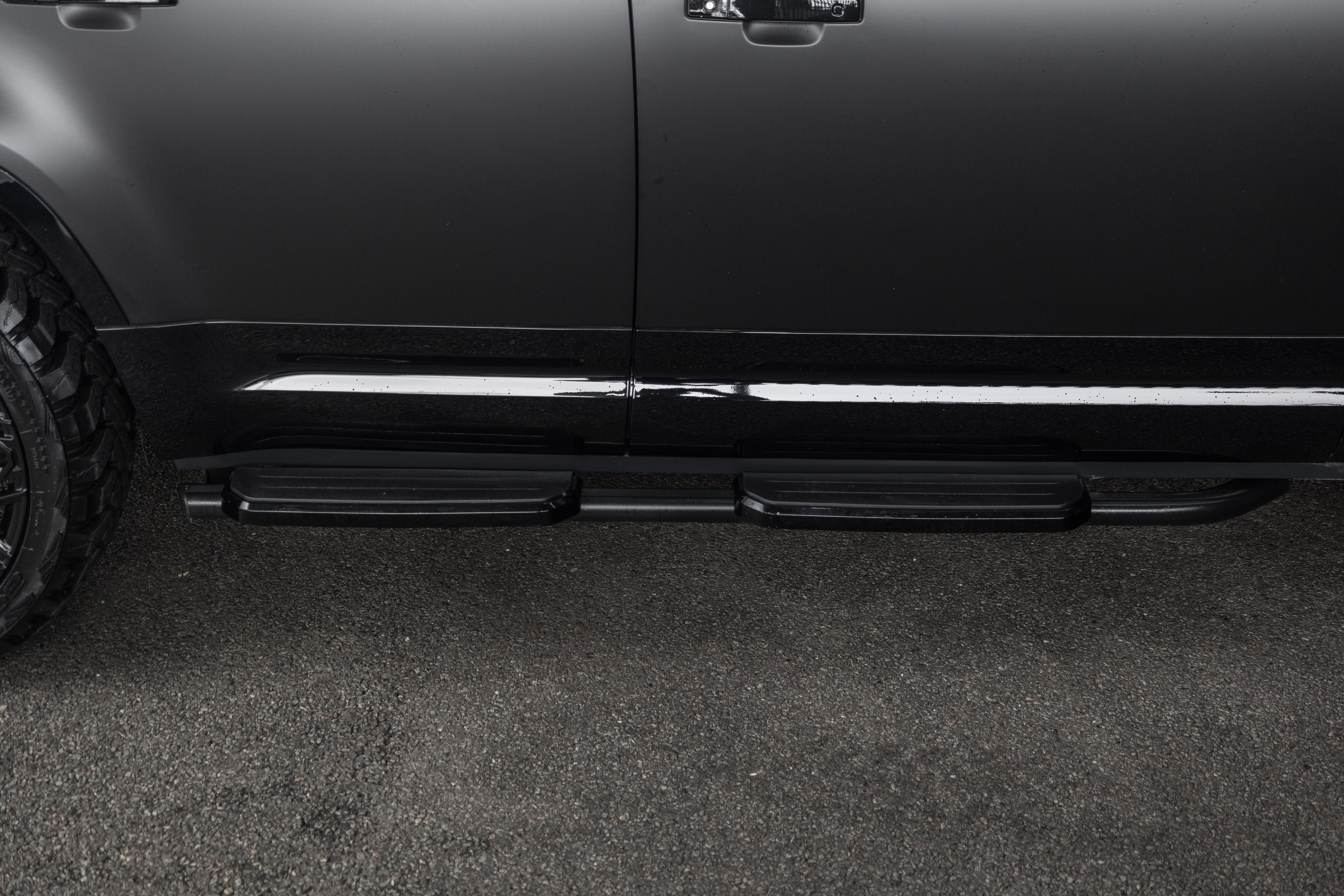 Gloss black defender side steps