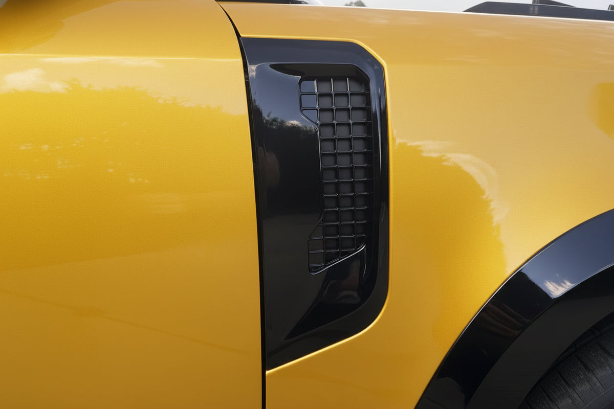 Land rover defender l663 gloss black side vents fitted to the vehicle