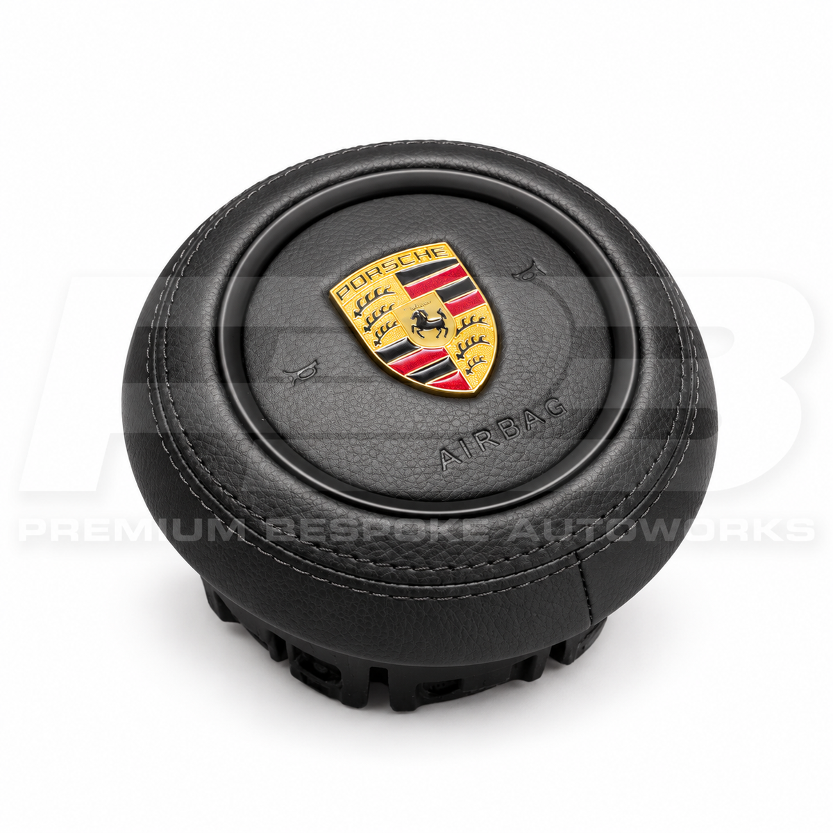 Porsche 911 997 custom airbag cover in black leather, angled view showing the fit over the original airbag unit