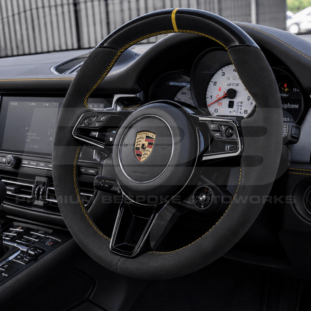 Porsche macan 95B.2 custom steering wheel in black alcantara with yellow stitching