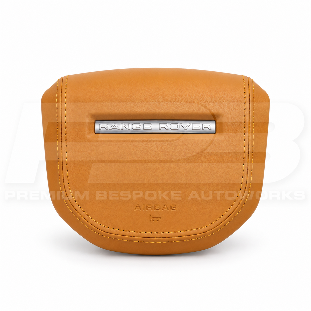 Range Rover Sport L461 custom airbag cover in tan leather with matching stitching, front view, replaces the original plastic cover