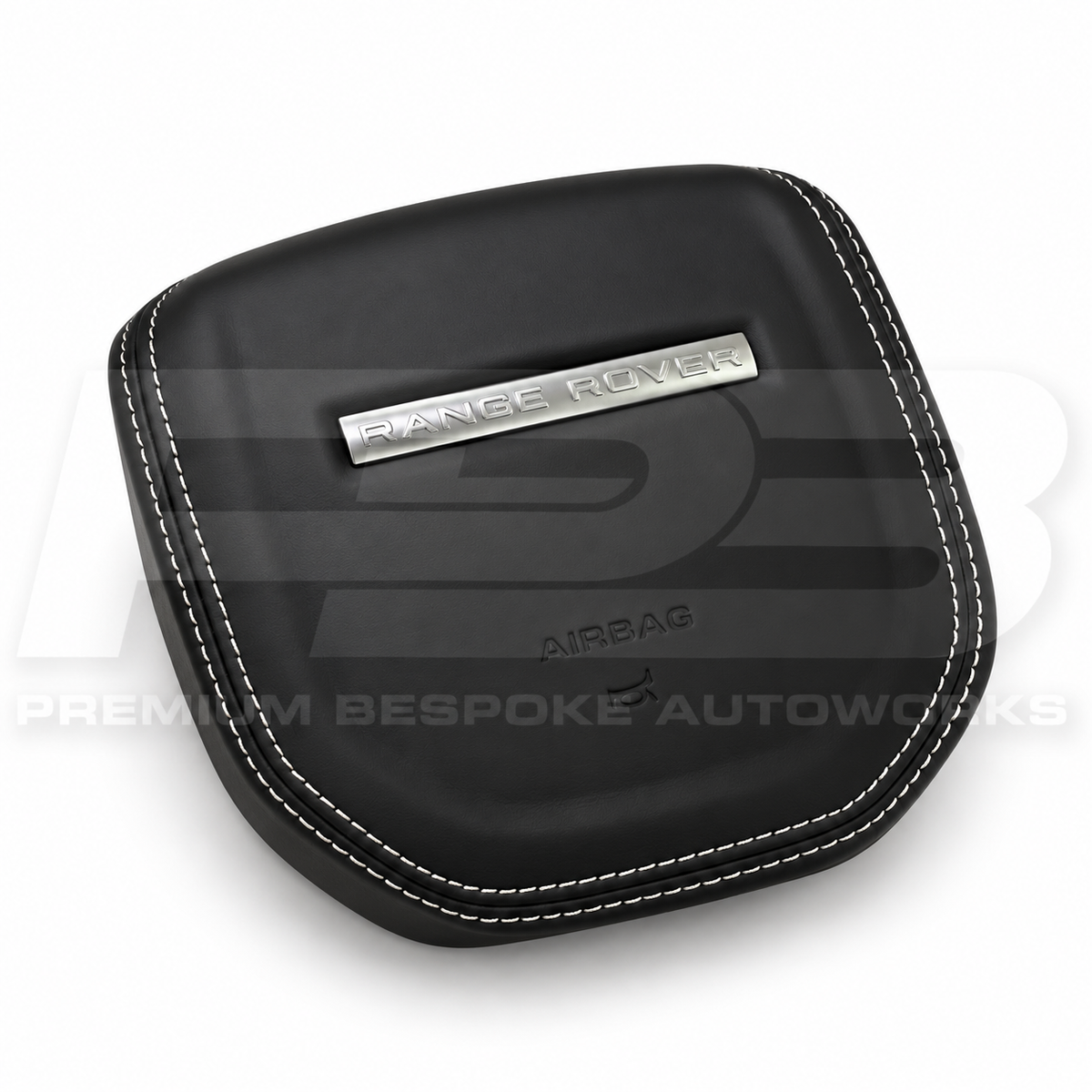 Range Rover Sport L494 custom airbag cover in black leather with white stitching, angled view showing the fit over the original airbag unit