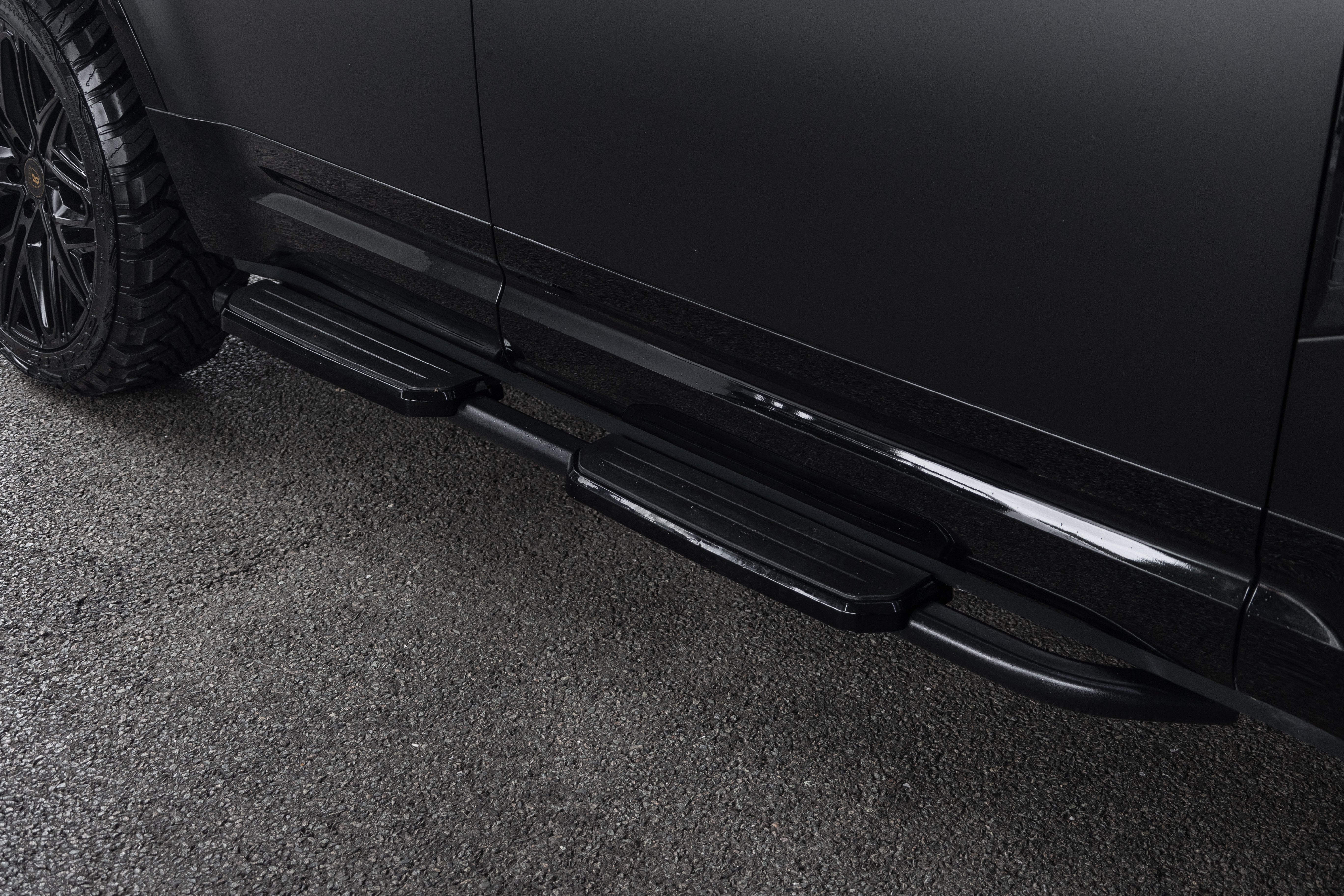 Gloss black defender 6l663 side steps