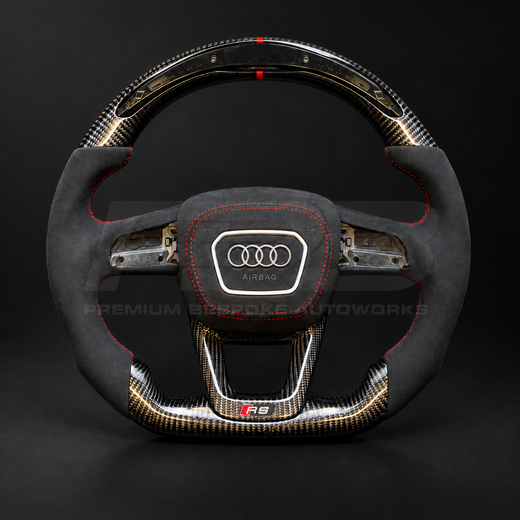 Audi RS4 B9.5 custom steering wheel, front view, flat bottom gloss carbon fibre with LED race display, black Alcantara grips and Alcantara airbag cover with red stitching, customer build by Premium Bespoke AutoWorks