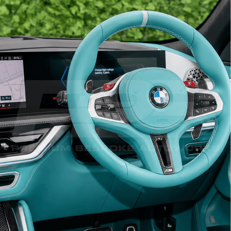 Bespoke BMW XM G09 steering wheel in gloss carbon fibre