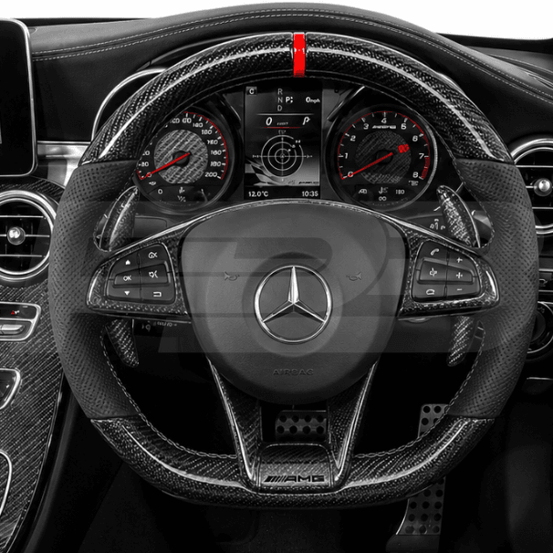 Car interior with steering wheel and dashboard of a Mercedes-Benz.
