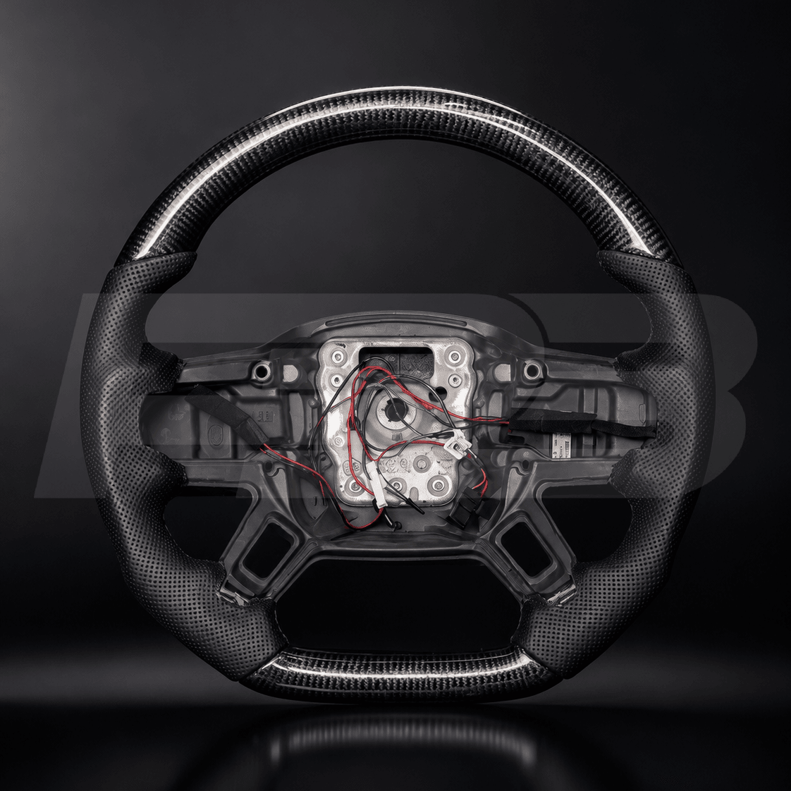 Defender L663 carbon fibre steering wheel core, as supplied — no airbag, switchgear or centre trim included