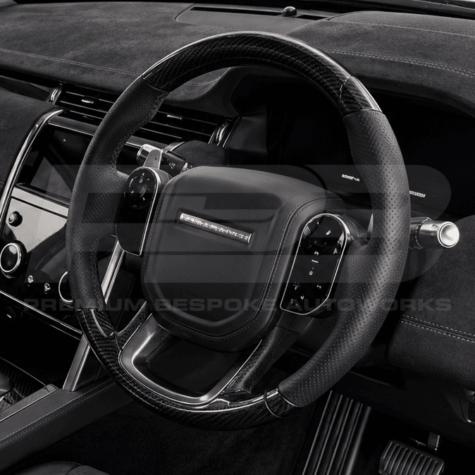 Land Rover Discovery Sport L550 Facelift steering wheel upgrade in gloss carbon fibre, hand finished on a genuine OEM core