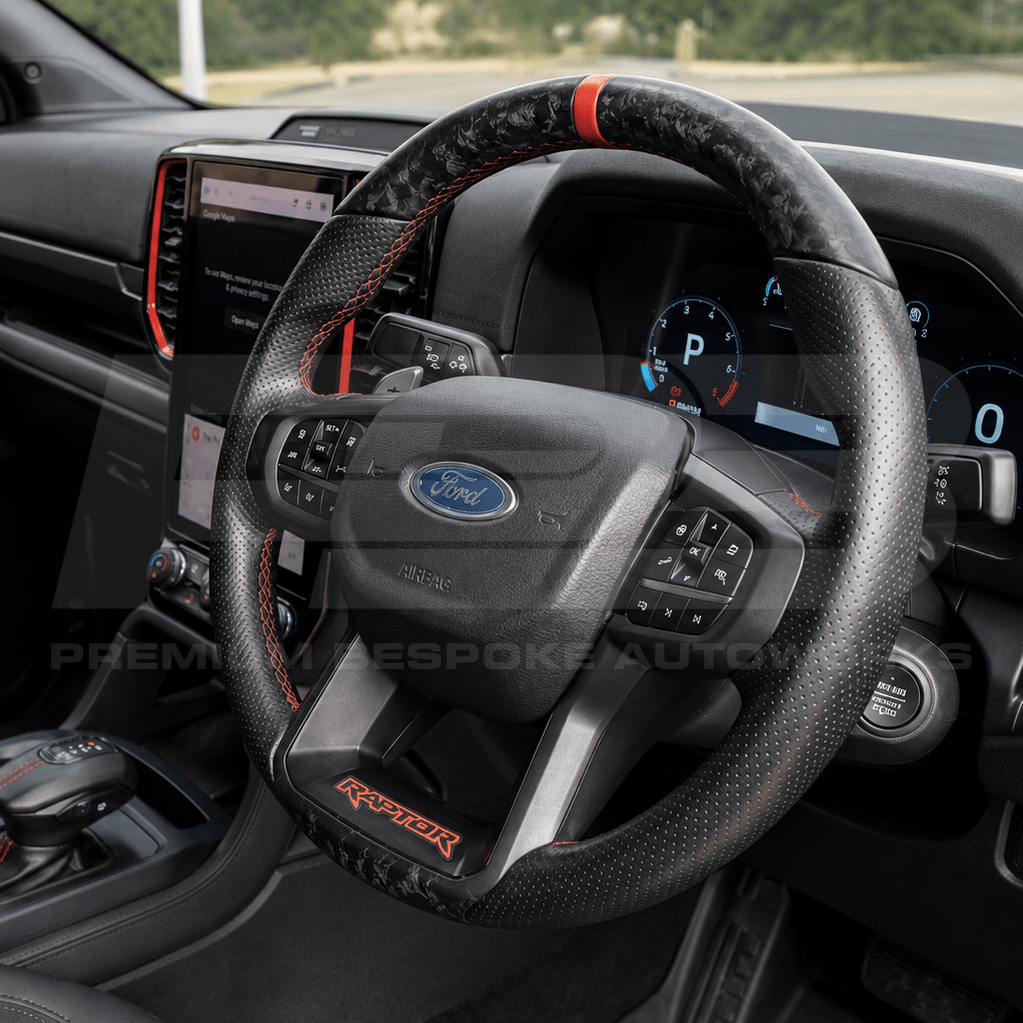 Ford Ranger Raptor Gen 2 custom steering wheel in forged carbon fibre, built to order by Premium Bespoke AutoWorks