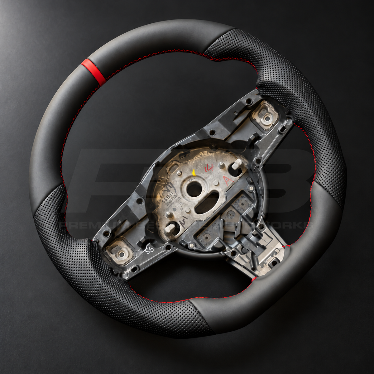 Jaguar F-Type custom steering wheel left angle showing red marker, nappa leather top section and contoured perforated grips