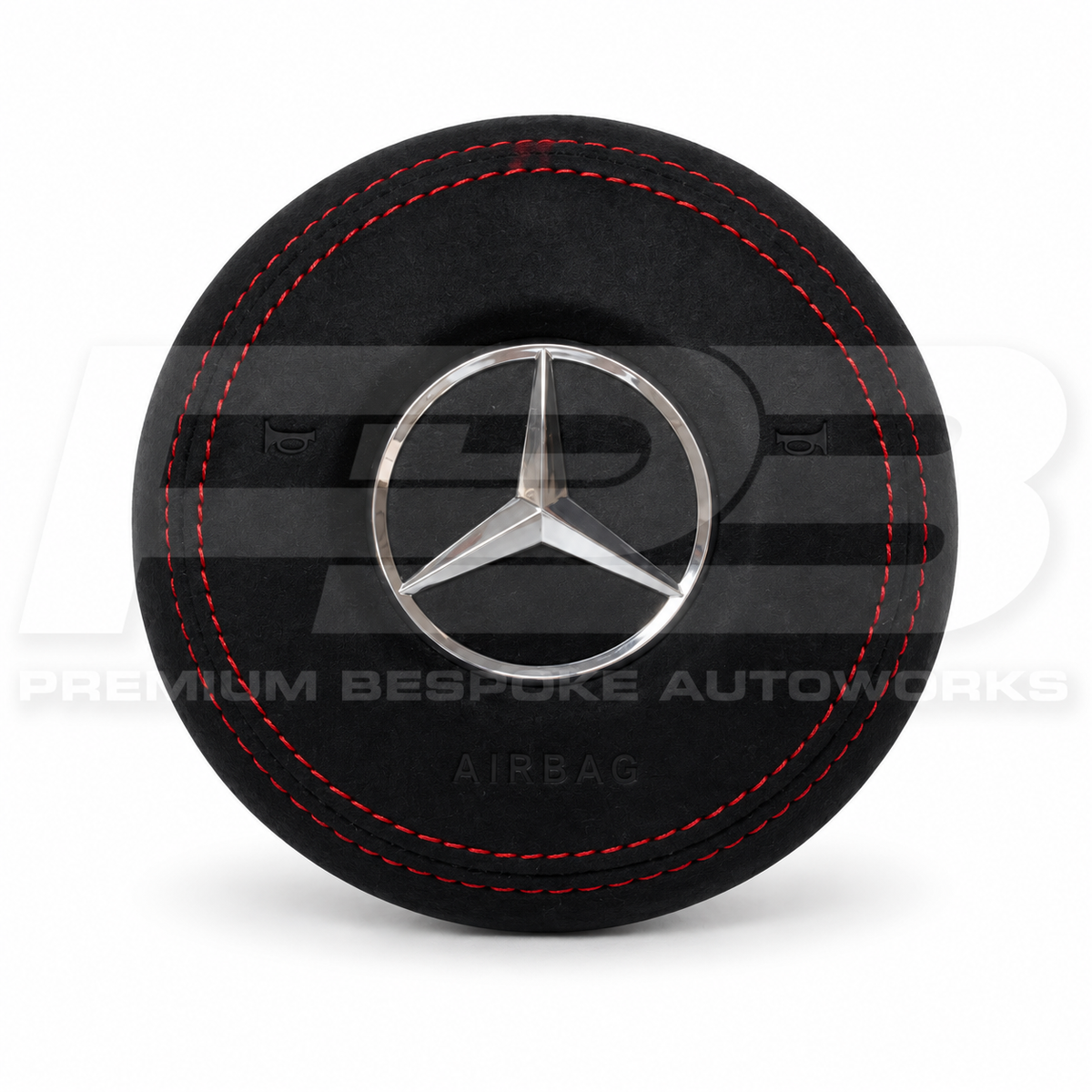 Mercedes A45 AMG W177 custom airbag cover in black Alcantara with red contrast stitching, front view, replaces the original plastic cover