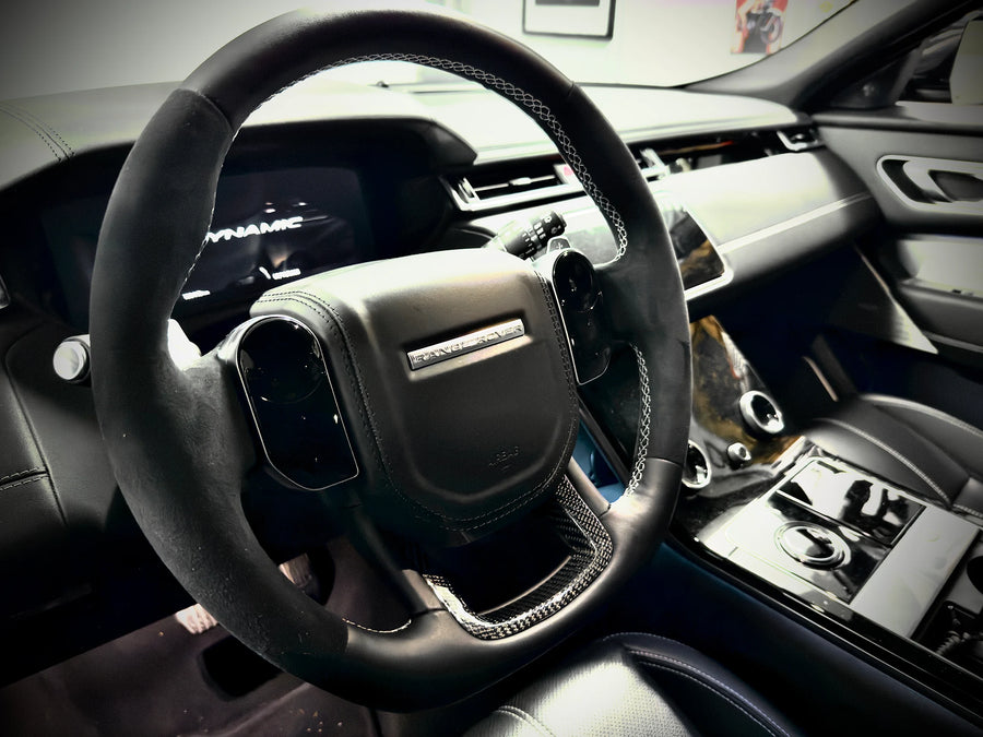 Customer photo of a Range Rover Velar L560 custom steering wheel fitted in the car