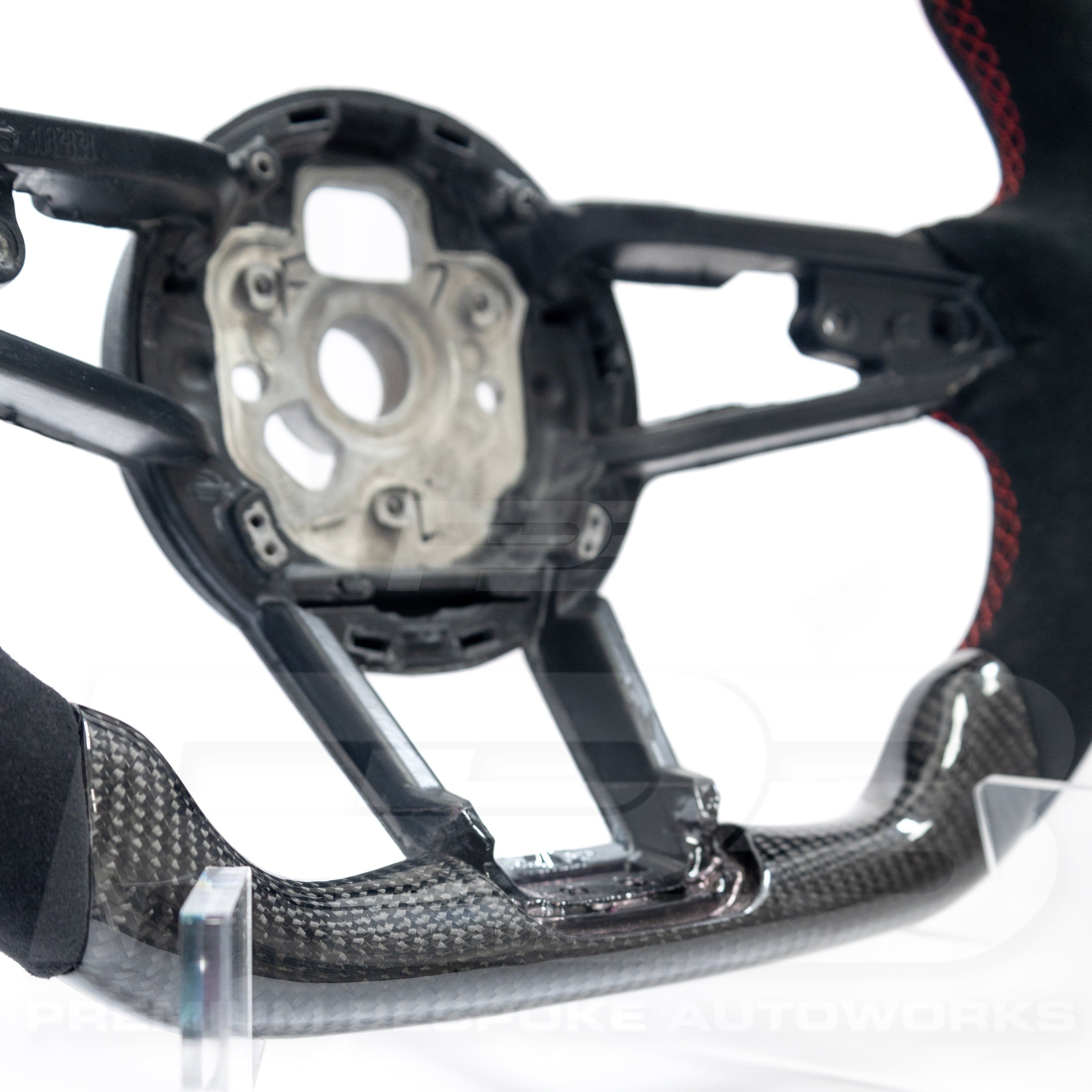 Audi R8 Carbon Fibre Steering Wheel Bottom close up image