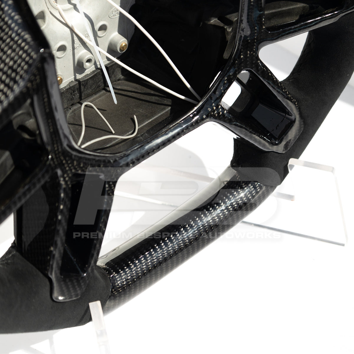 Land Rover Defender L663 Carbon Fibre Steering Wheel Close Up Image