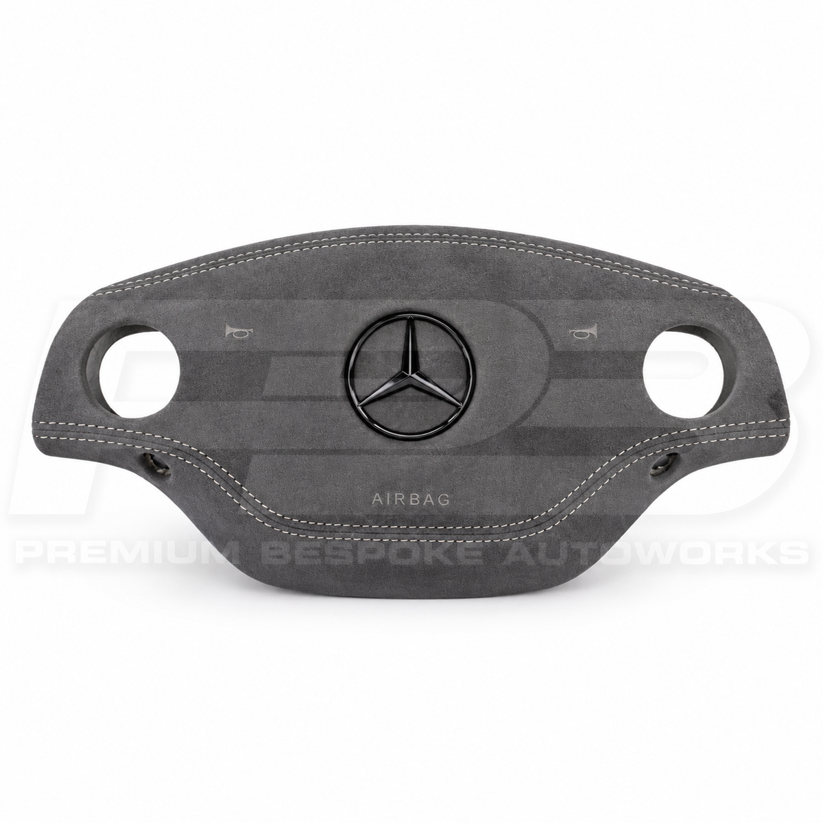 Mercedes CL C216 custom airbag cover in grey Alcantara with white contrast stitching and black star, front view, replaces the original plastic cover