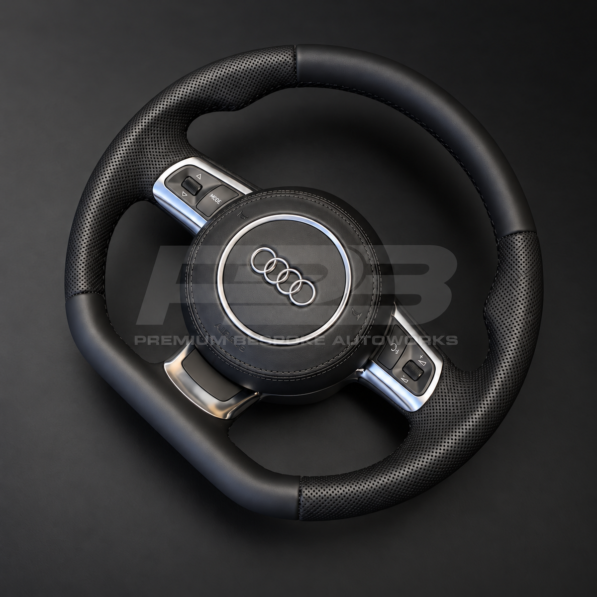 Audi R8 Gen 1 custom steering wheel rotated to show the flat bottom section in smooth black leather and the silver lower trim