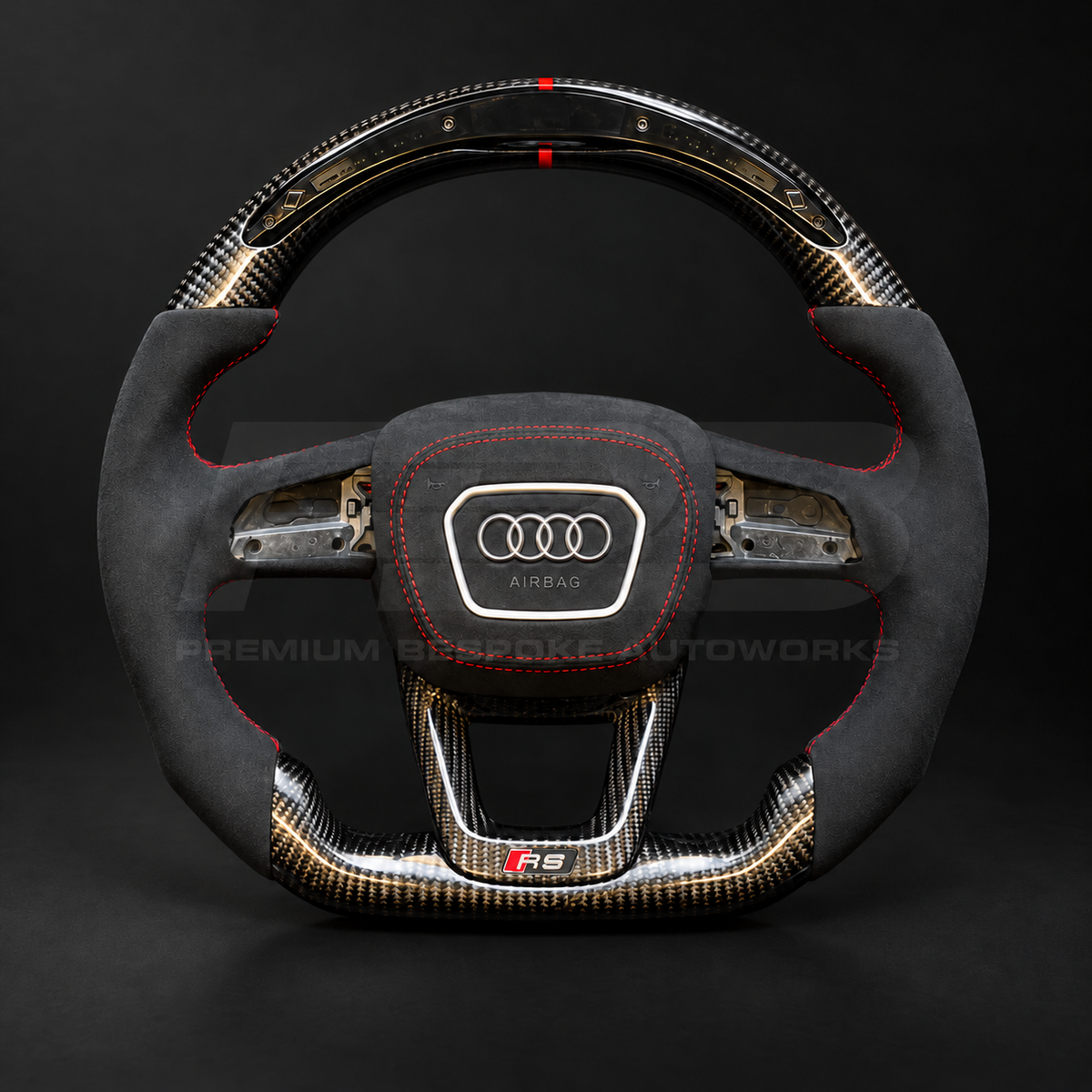 Audi RS4 B9.5 custom steering wheel, front view, flat bottom gloss carbon fibre with LED race display, black Alcantara grips and Alcantara airbag cover with red stitching, customer build by Premium Bespoke AutoWorks