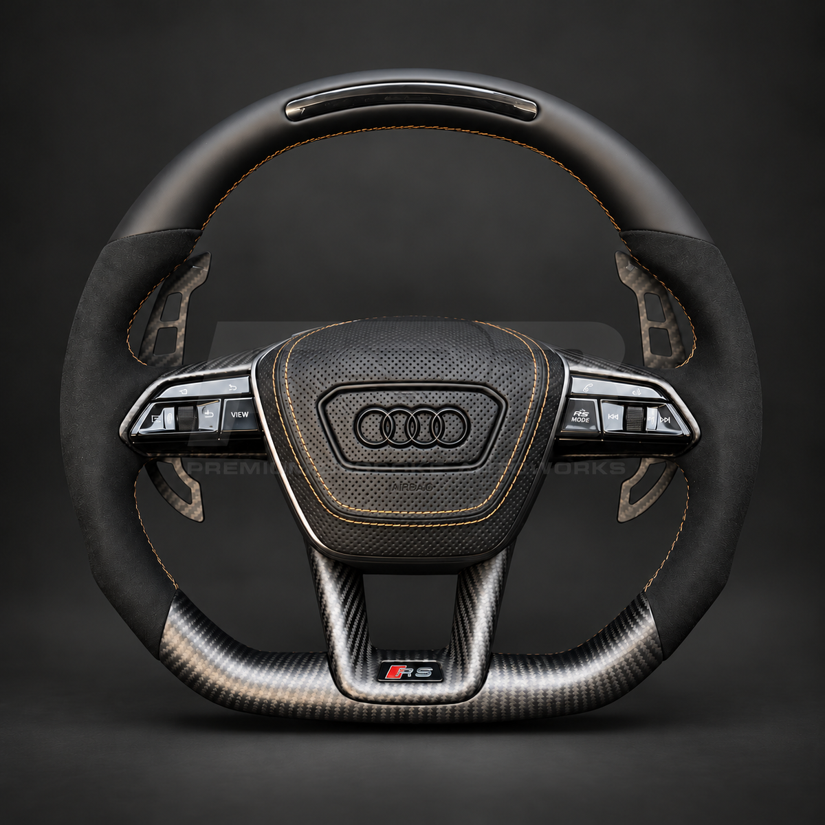 Audi RS7 4K8 custom steering wheel front view showing black Nappa leather top with RPM lights, matte carbon bottom, Alcantara grips and copper stitching