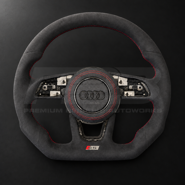 Audi S5 B9 custom steering wheel front view showing flat bottom, black Alcantara throughout, red stitching and Alcantara airbag cover