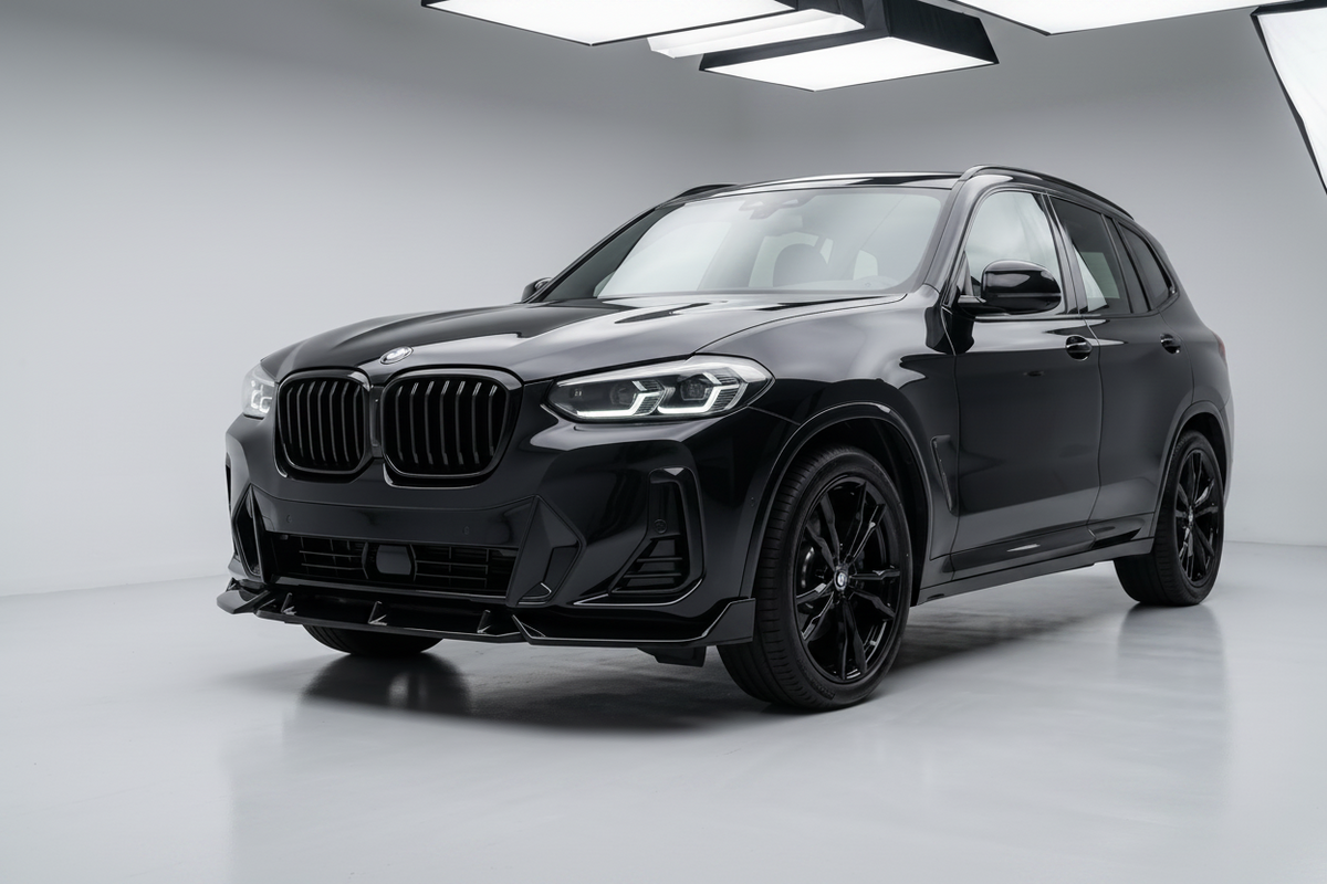 Gloss black Competition front splitter fitted to a gloss black BMW X3 LCI - Premium Bespoke AutoWorks