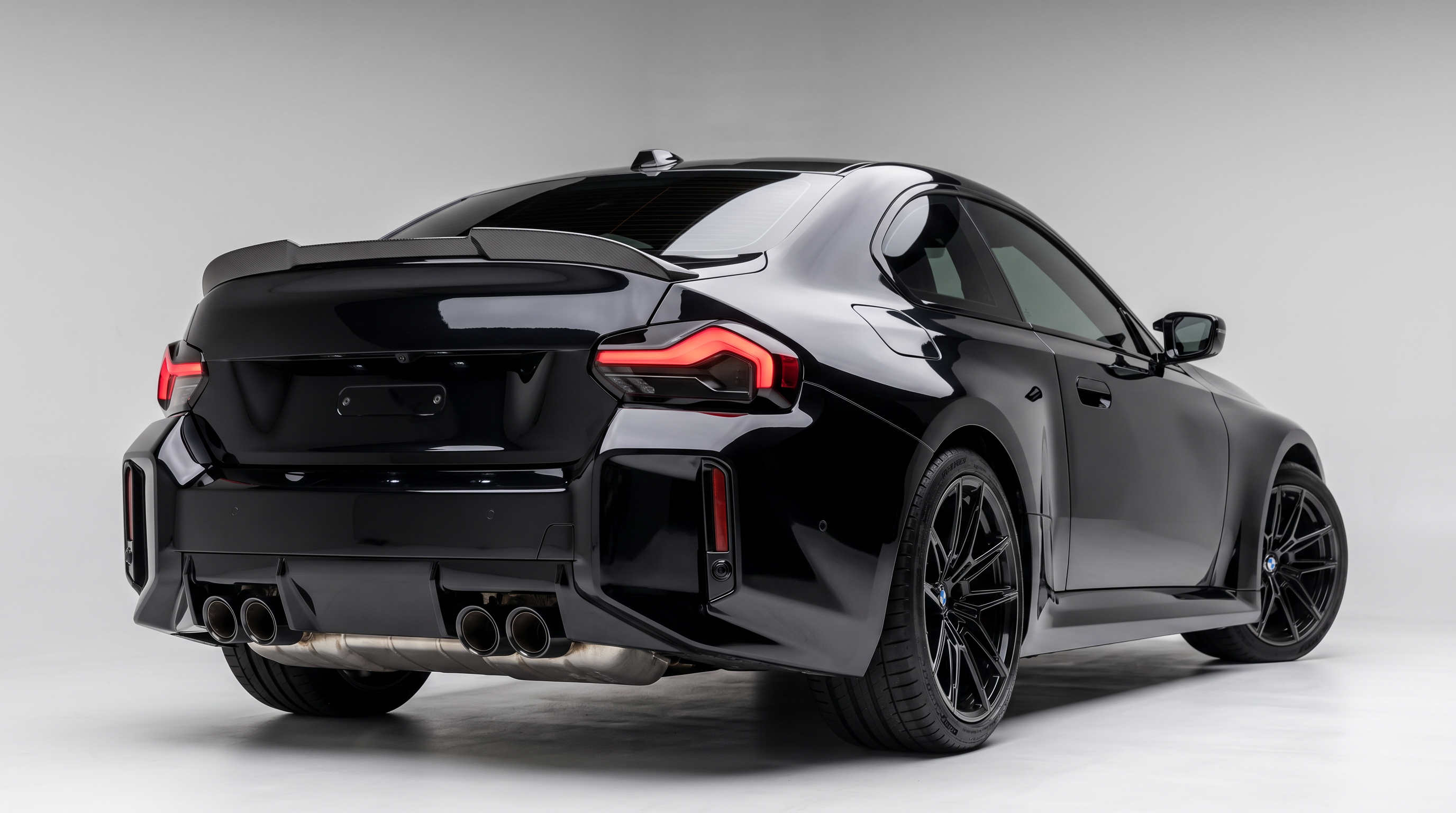 BMW M2 G87 & M240i G42 rear reverse light tint overlay fitted to a gloss black 2 Series - Premium Bespoke AutoWorks