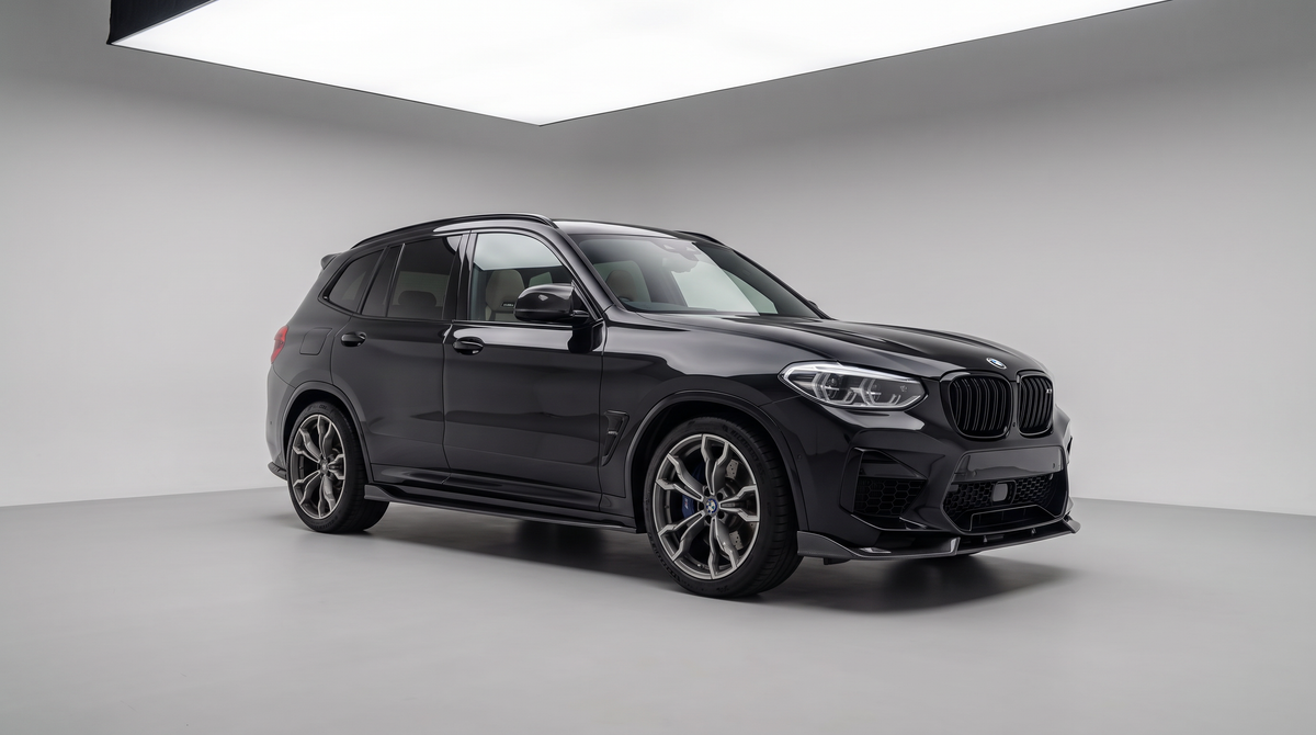 BMW X3M F97 carbon fibre side skirts fitted to a gloss black X3M, front three-quarter - Premium Bespoke AutoWorks