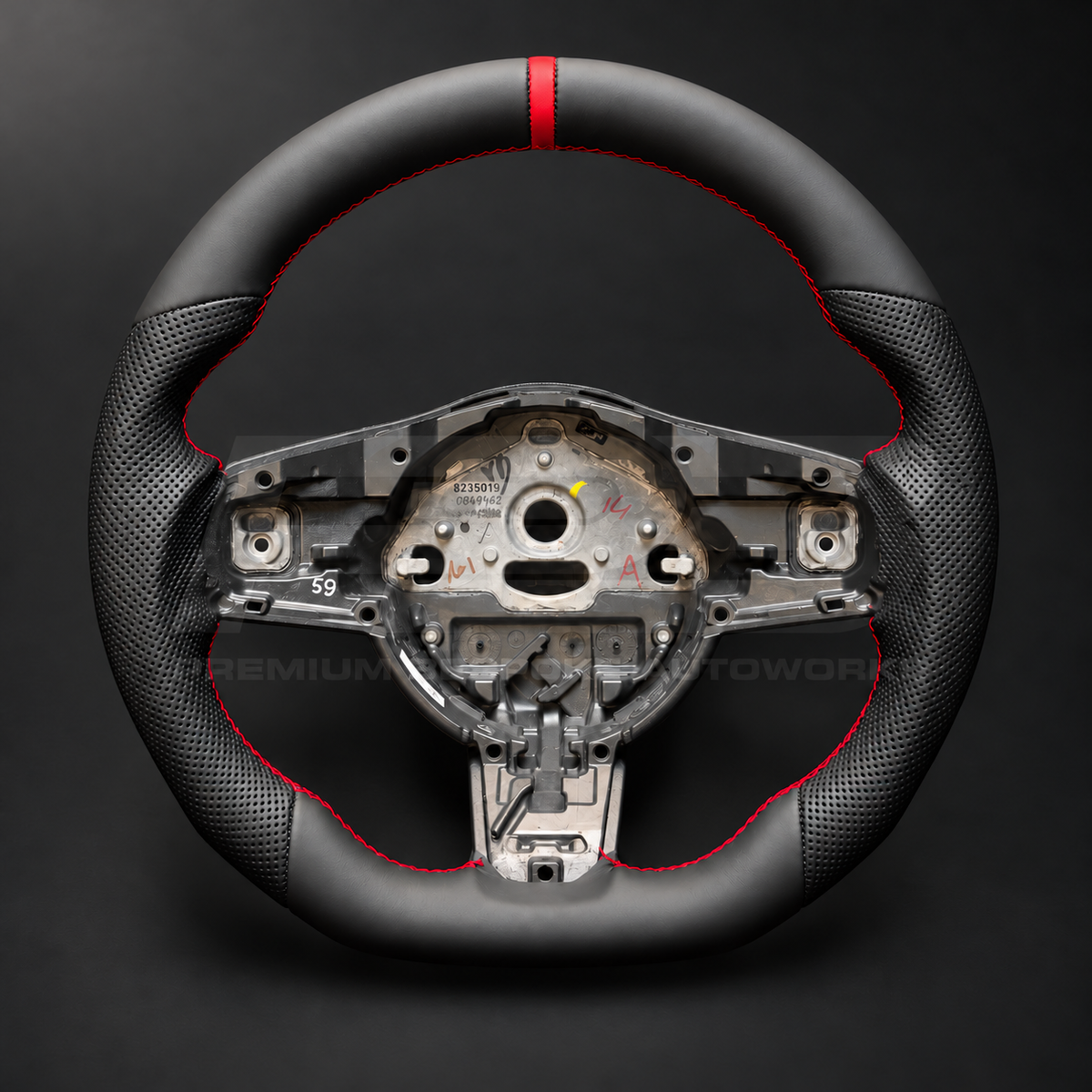 Jaguar F-Type custom steering wheel front view, flat bottom, smooth black nappa leather top and bottom, perforated grips, red stitching and red 12 o'clock marker