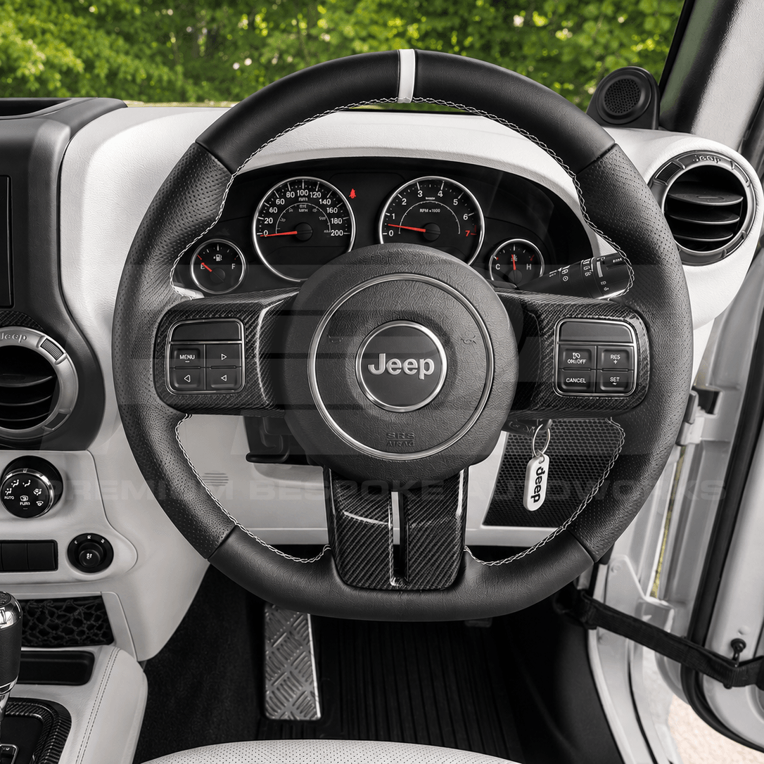 Jeep Wrangler JK steering wheel upgrade in gloss carbon fibre, hand finished on a genuine OEM core