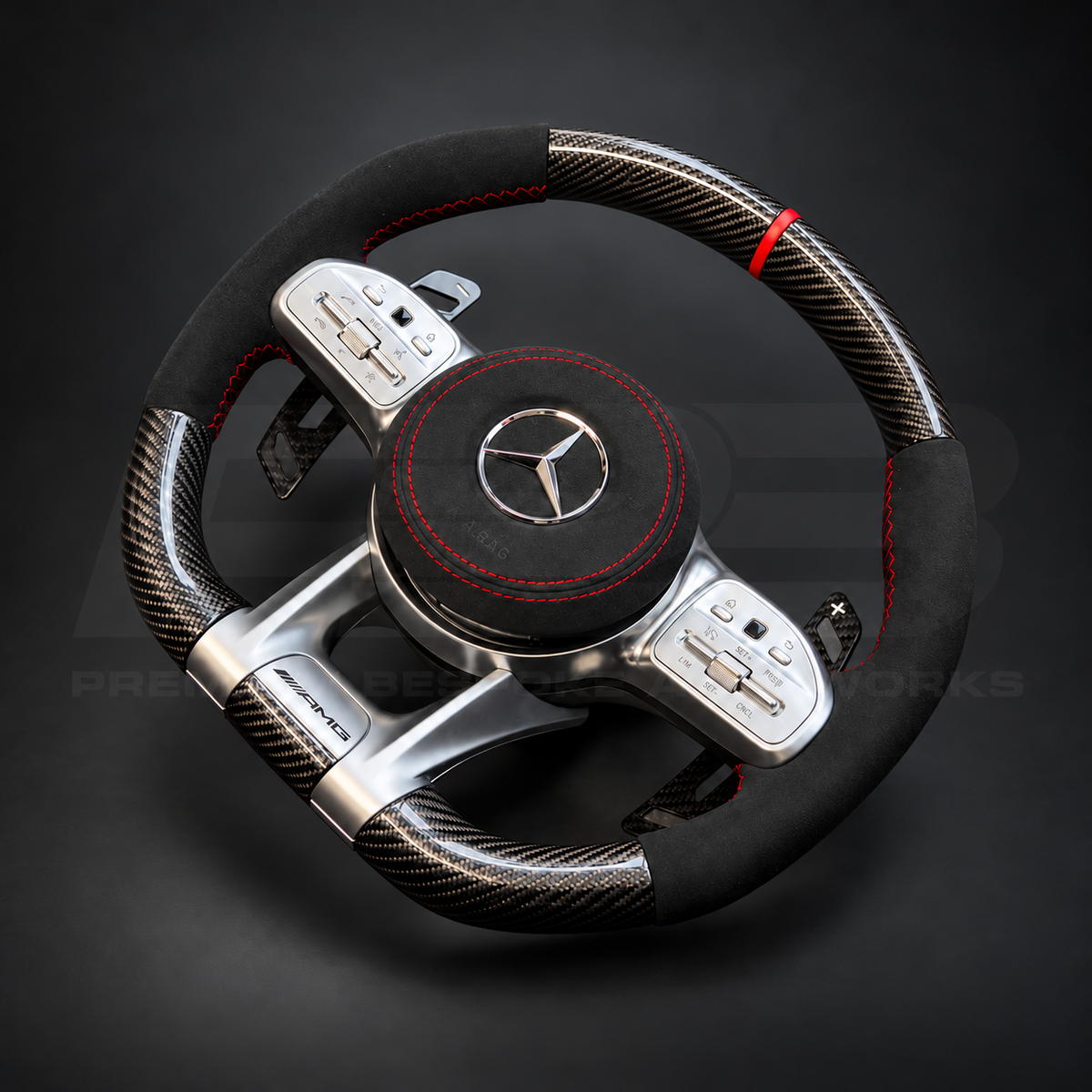 Mercedes-AMG A45 W177 custom steering wheel right angle showing gloss carbon fibre, black Alcantara grips and airbag cover, red stitching and red marker