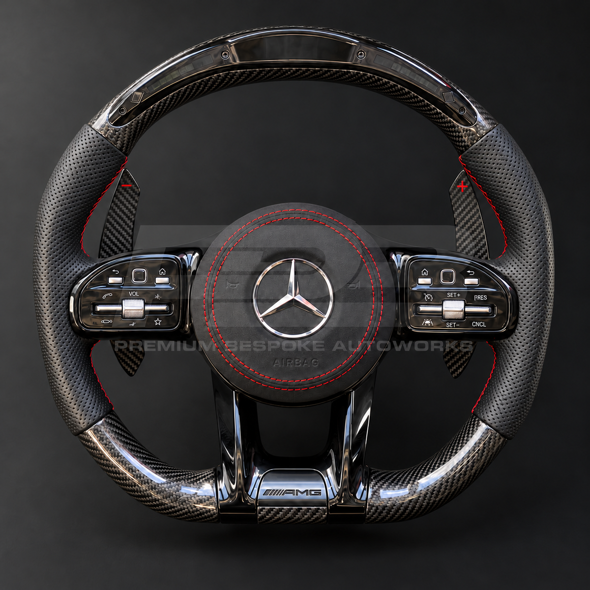 Mercedes-AMG C43 W205 Facelift custom steering wheel front view showing gloss carbon fibre top and bottom, RPM lights bar, black perforated leather grips, red stitching and Alcantara airbag cover