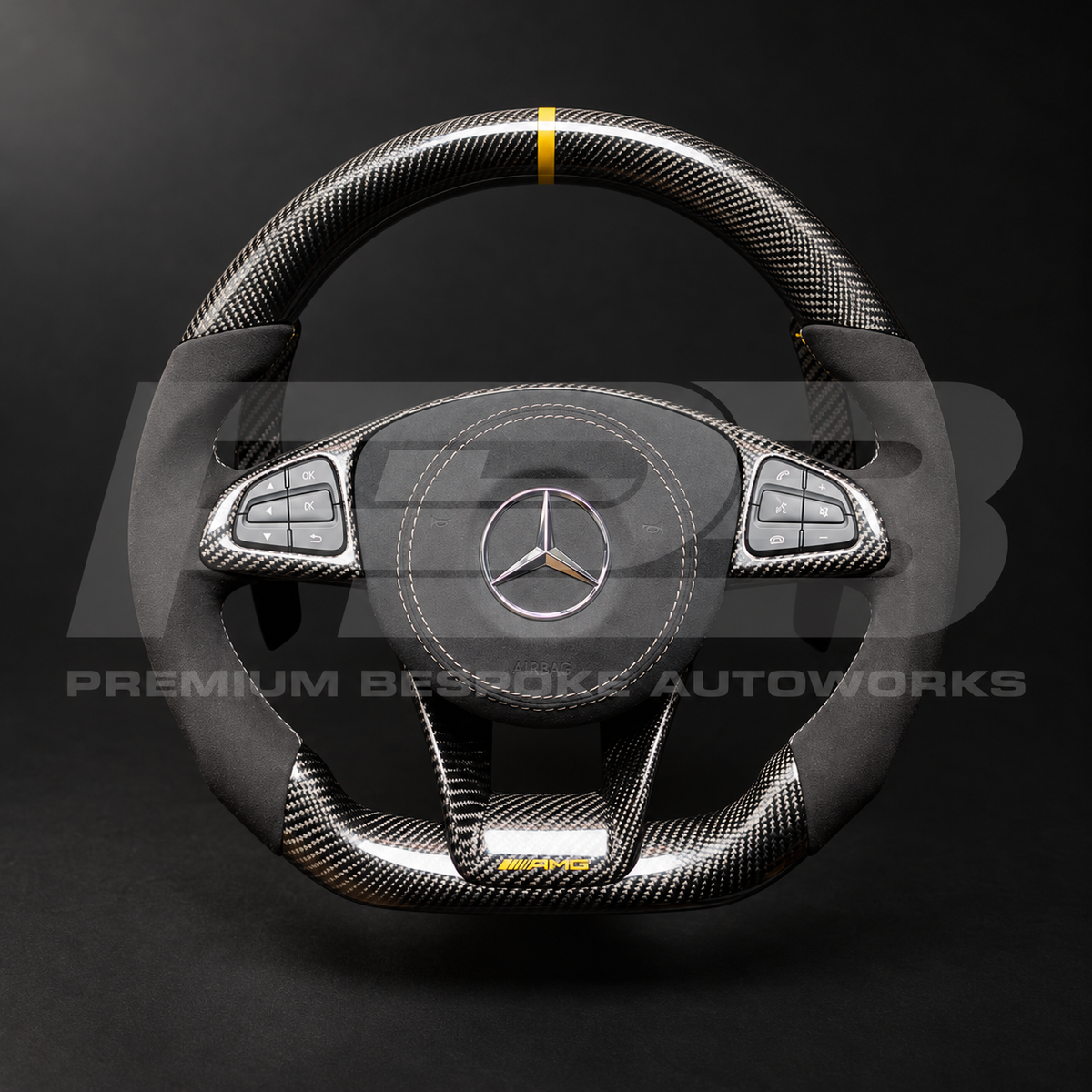 Mercedes-AMG GLE 63 W166 custom steering wheel as built, flat bottom, gloss carbon fibre with gold 12 o'clock marker, black Alcantara grips, grey stitching, Alcantara airbag cover, carbon trims with gold AMG badge