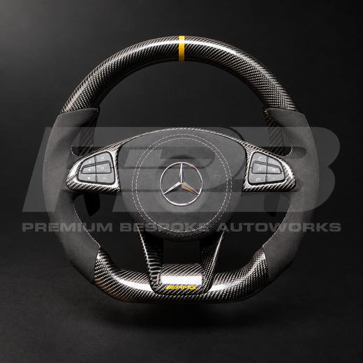 Mercedes-AMG GLE 63 W166 custom steering wheel as built, flat bottom, gloss carbon fibre with gold 12 o'clock marker, black Alcantara grips, grey stitching, Alcantara airbag cover, carbon trims with gold AMG badge