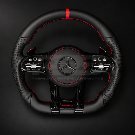 Mercedes-AMG C43 W205 facelift custom steering wheel, front view, smooth black leather with perforated grips, red stitching, red leather marker and gloss black trims and paddles, customer build by Premium Bespoke AutoWorks