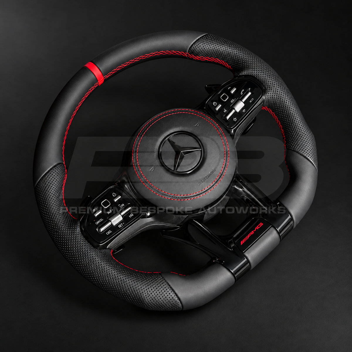 Mercedes-AMG C43 W205 facelift custom steering wheel rotated to show the red stitched leather airbag cover and gloss black button covers