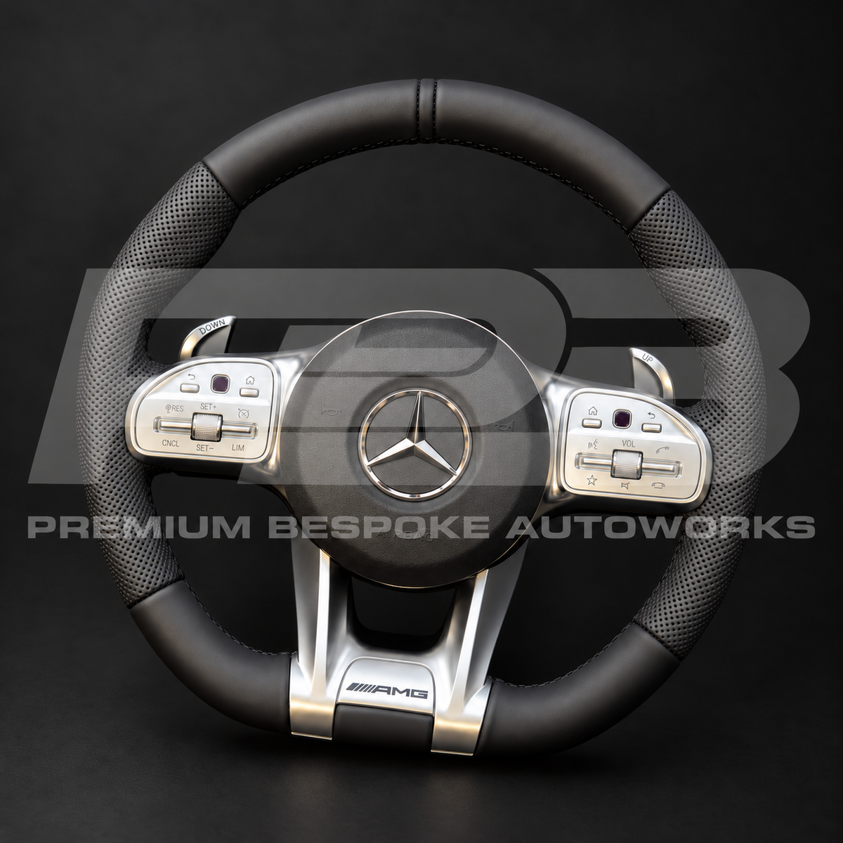 Mercedes-AMG G63 W463 custom steering wheel from the right, factory spec black leather with silver AMG trims and paddle shifters