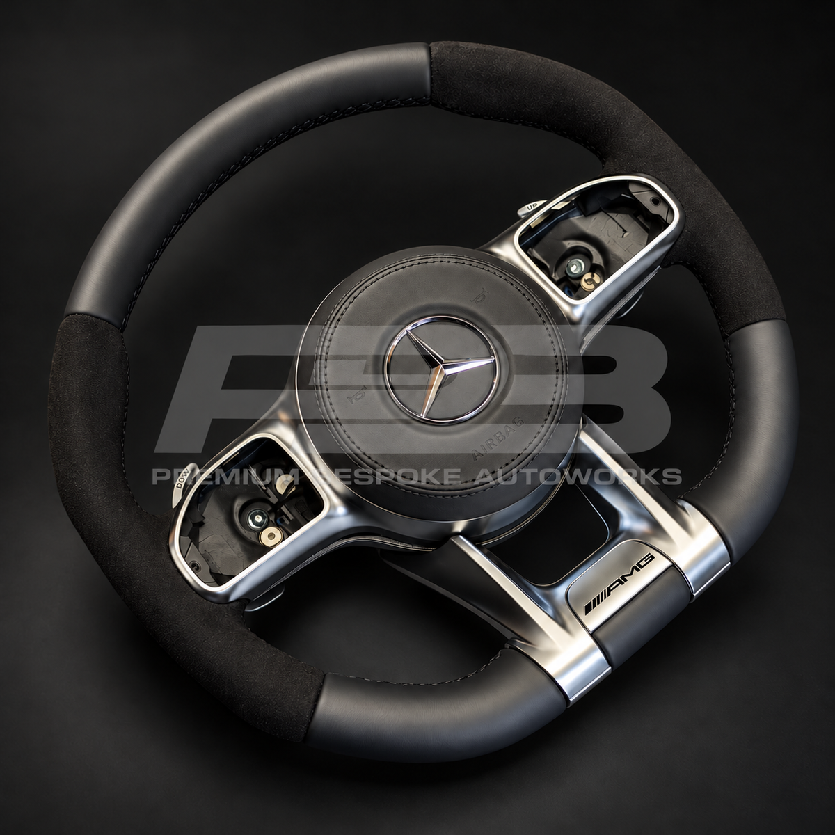 Mercedes-AMG GLE V167 custom steering wheel, angled view showing the Alcantara grip, black stitching and factory silver paddle shifters