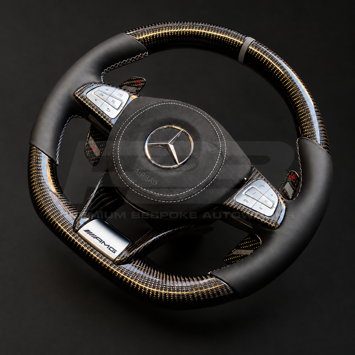 Mercedes-AMG S63 W222 custom steering wheel right angle showing carbon fibre top section, nappa leather grips and carbon paddle shifters