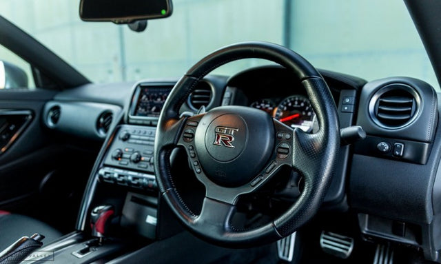 Nissan GT-R R35 DBA interior with the factory steering wheel
