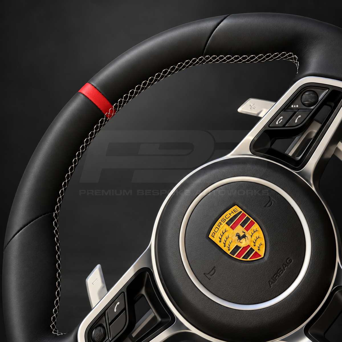 Porsche 911 991.2 custom steering wheel close up detail showing black Nappa leather, grey stitching, red 12 o'clock marker and silver paddles