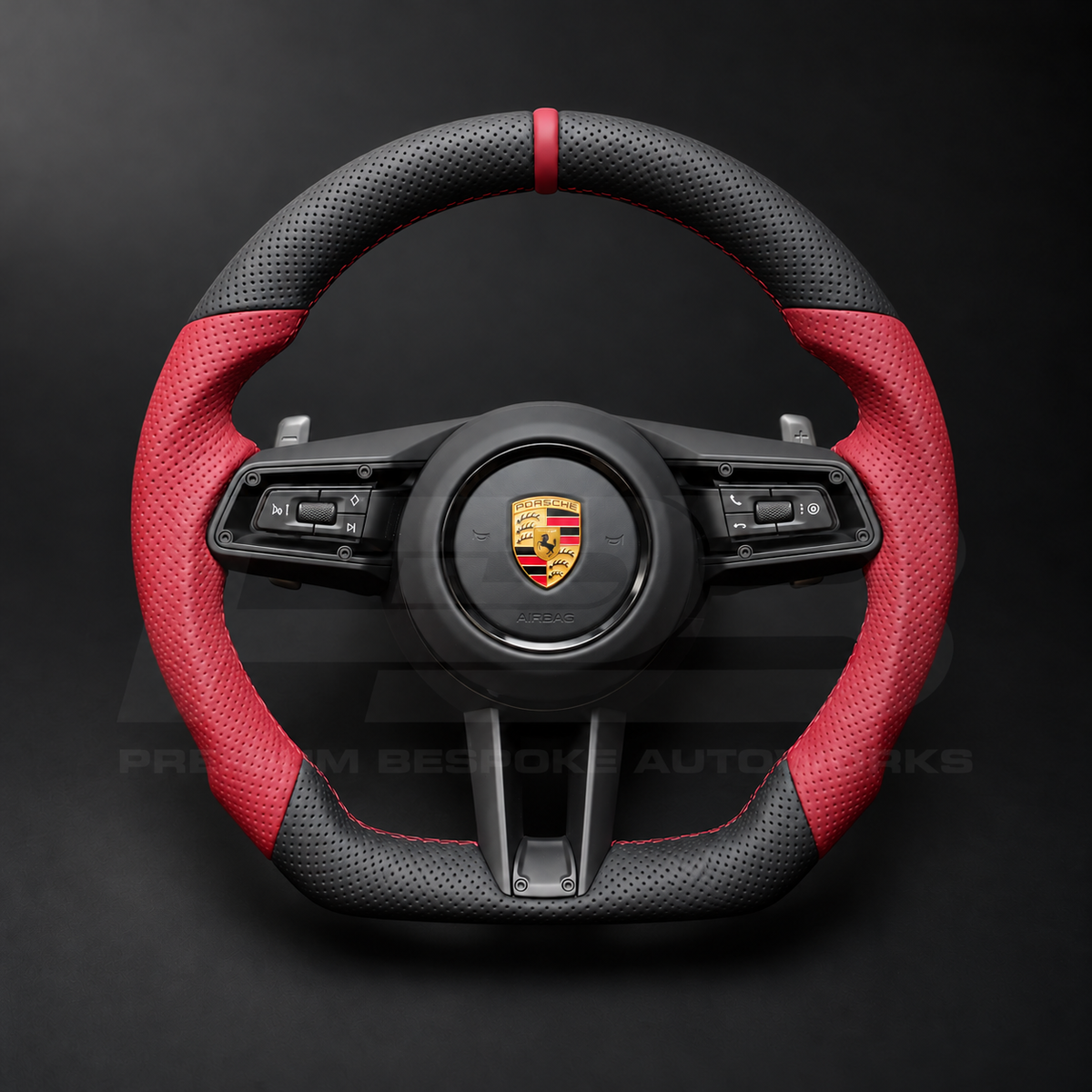 Porsche 911 992 custom steering wheel front view, flat bottom, perforated black leather, red perforated grips, red stitching and red 12 o'clock marker