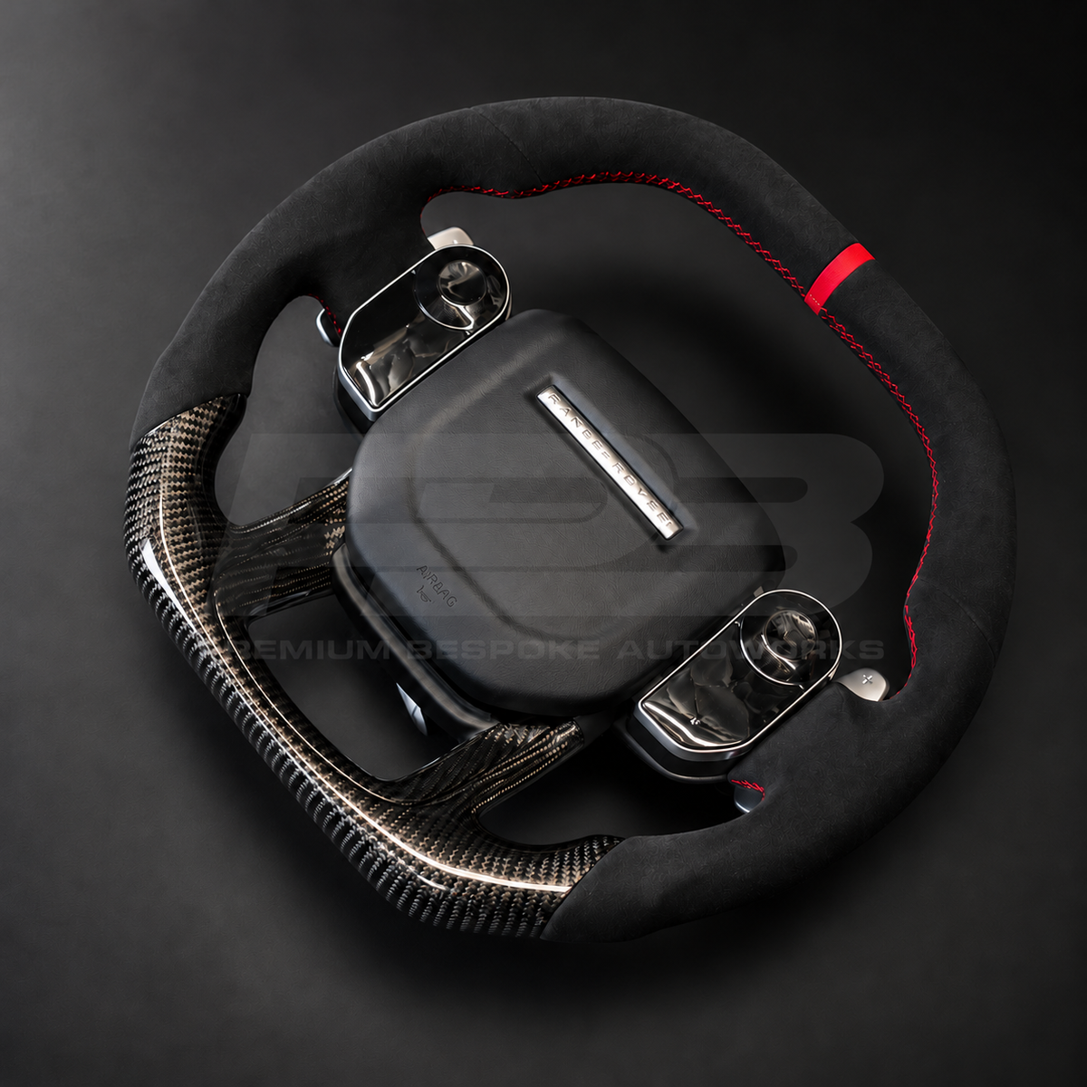 Range Rover Sport L494 custom steering wheel right angle showing flat bottom carbon section, Alcantara grip and touch control switches